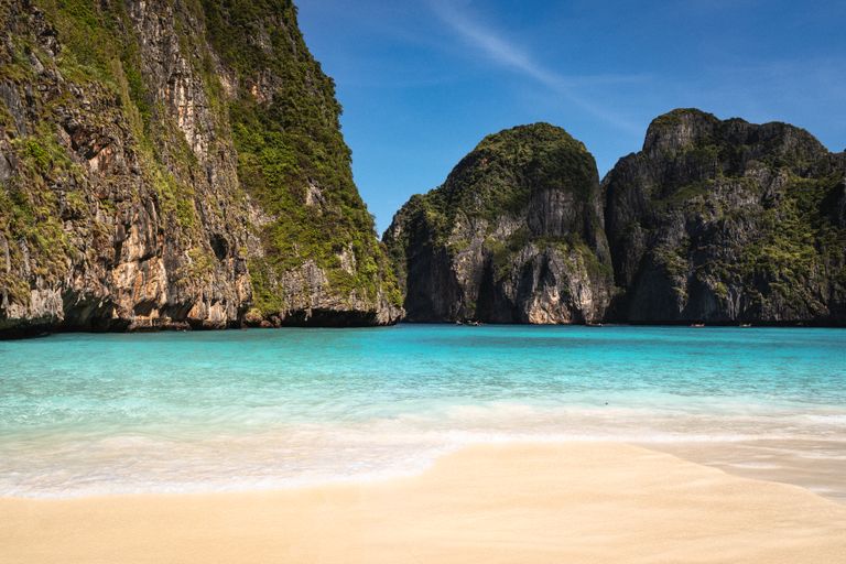 Turquoise waters and limestone cliffs in Krabi, Thailand offer a breathtaking beach view. Maya Bay Thailand