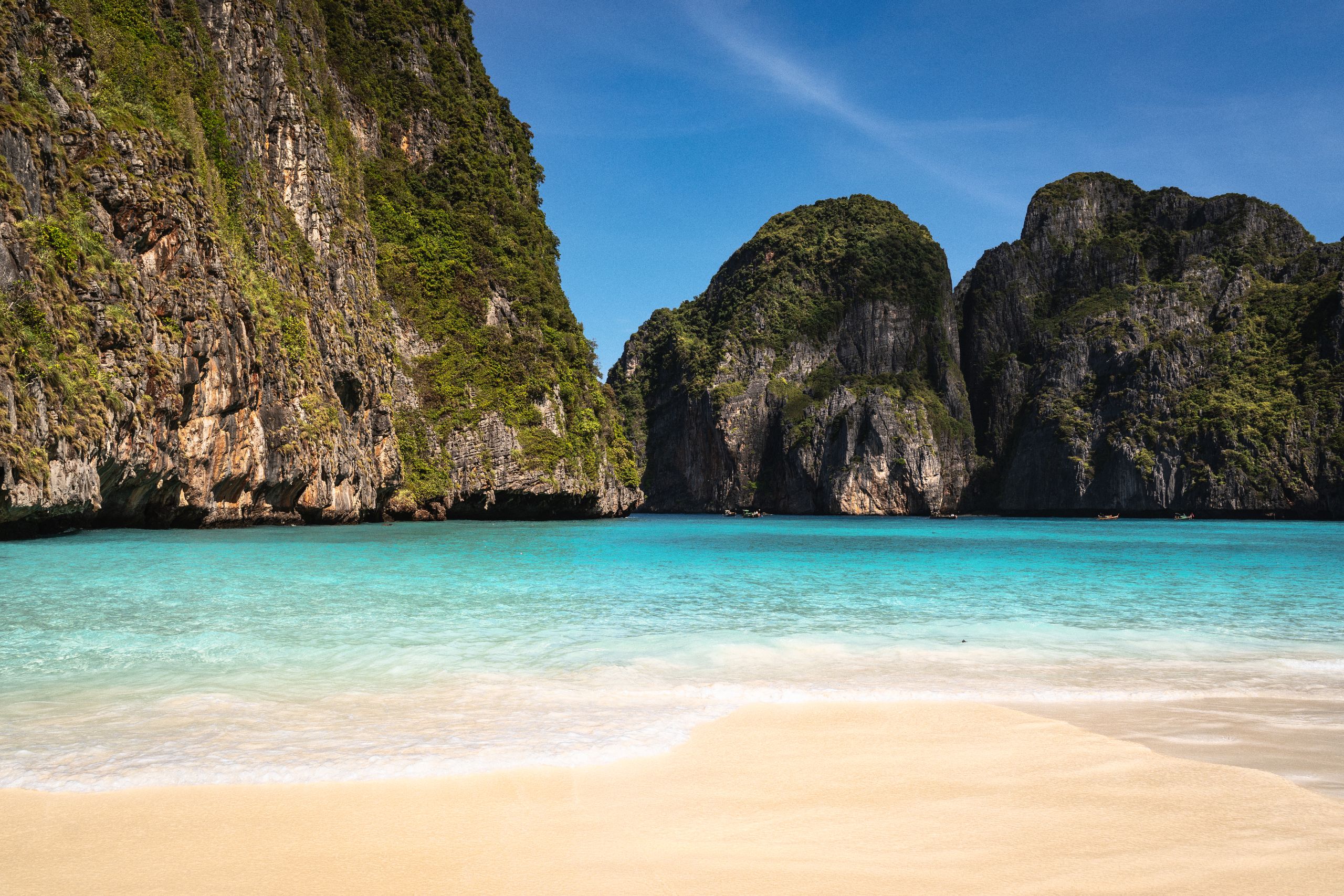 Turquoise waters and limestone cliffs in Krabi, Thailand offer a breathtaking beach view. Maya Bay Thailand